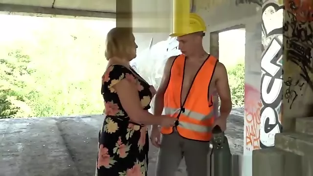GILF cowgirl makes young construction worker cum