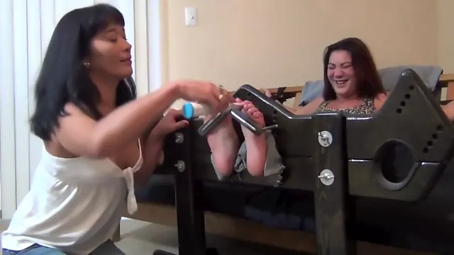 mom tickles daughter