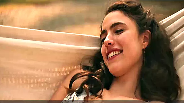 Brunette bombshell Margaret Qualley enjoys outdoor kissing and topless sex in smiley indoor video